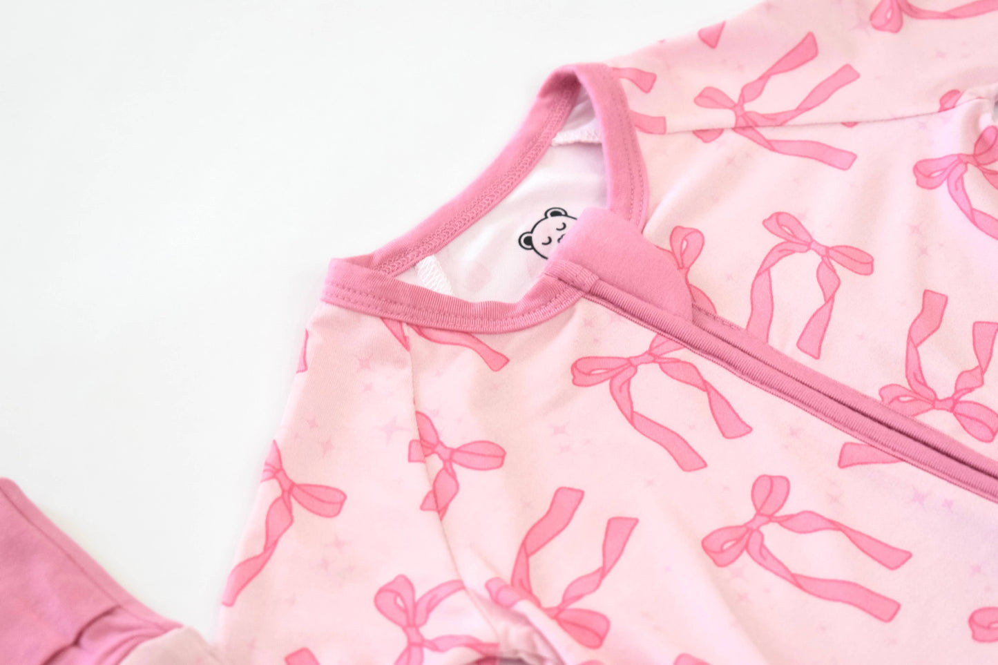 Pretty in Bows Convertible Zip Onesie